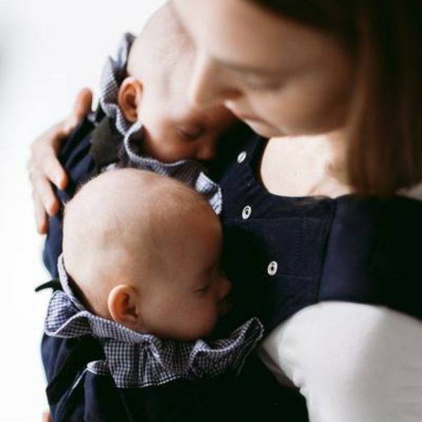 Nurturing Twins in a Weego Twin Carrier